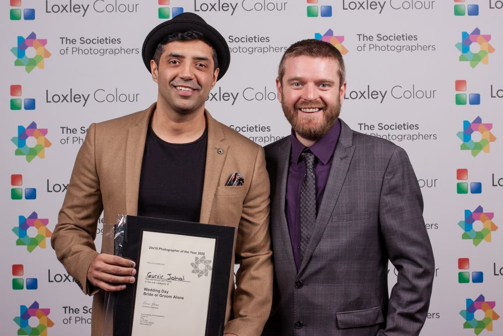 Ben Jones presents Gurvir Johal with the award.