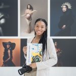 Grimmy West Photography Tianna J Williams in front of her exhibit