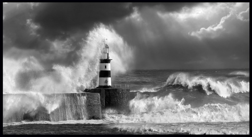Waves crashing over Seaham Lighthouse on the northeast coast of England.