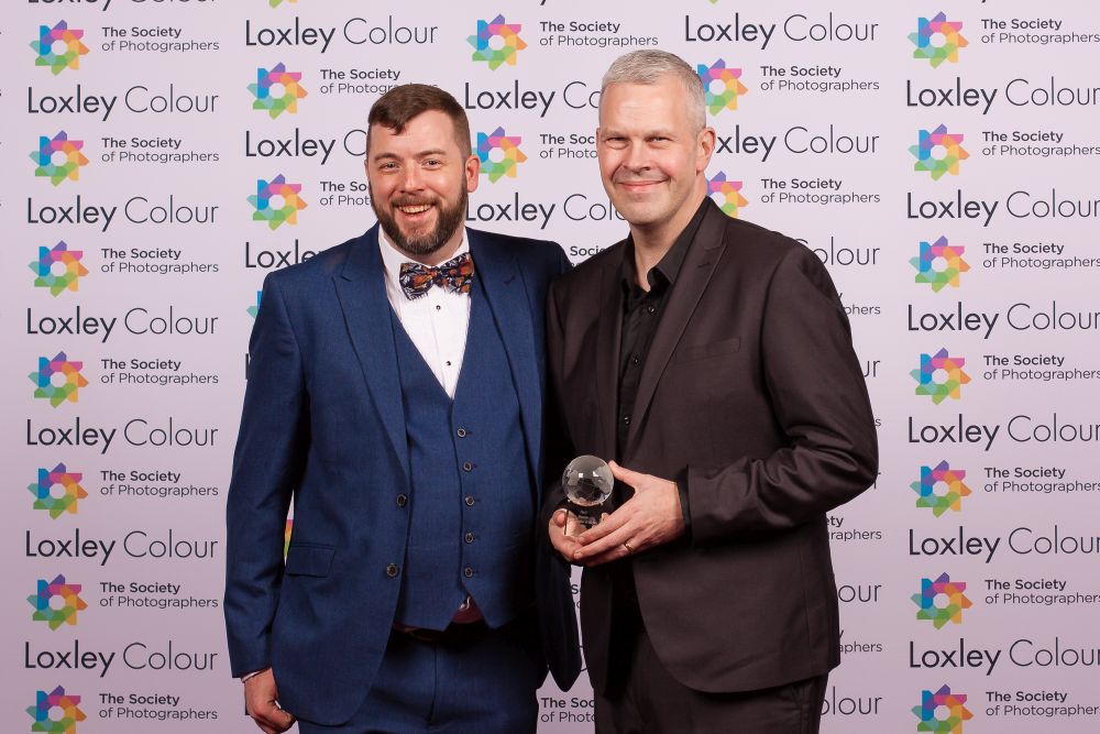 Colin Jones, The Society of Photographers CEO presenting the trophy to Gary.