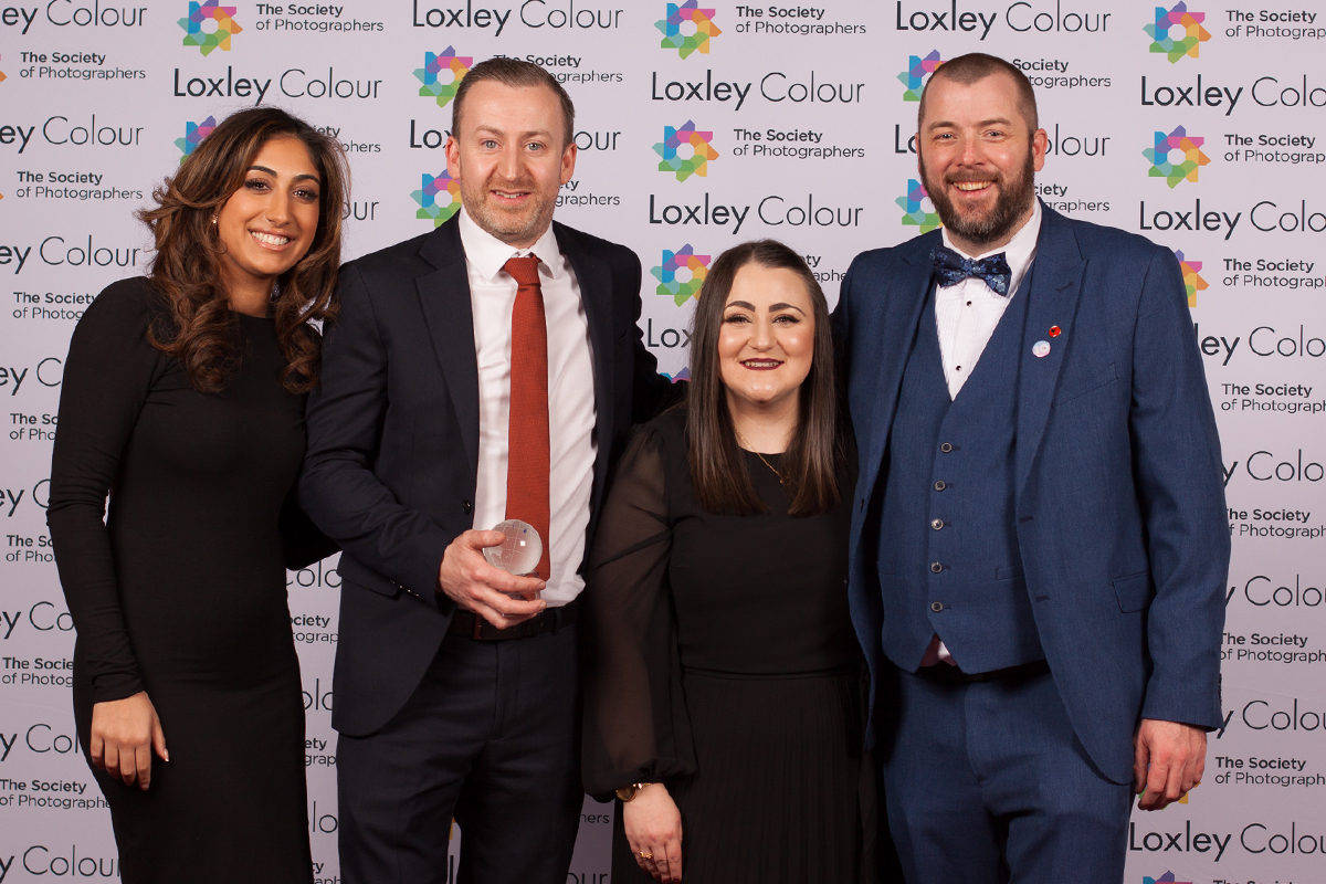 The Best Professional Album 2024 "Colin Jones, The Society of Photographers’ CEO, presenting The Loxley Colour Team with The Best Professional Album 2024 Award at the ceremony."