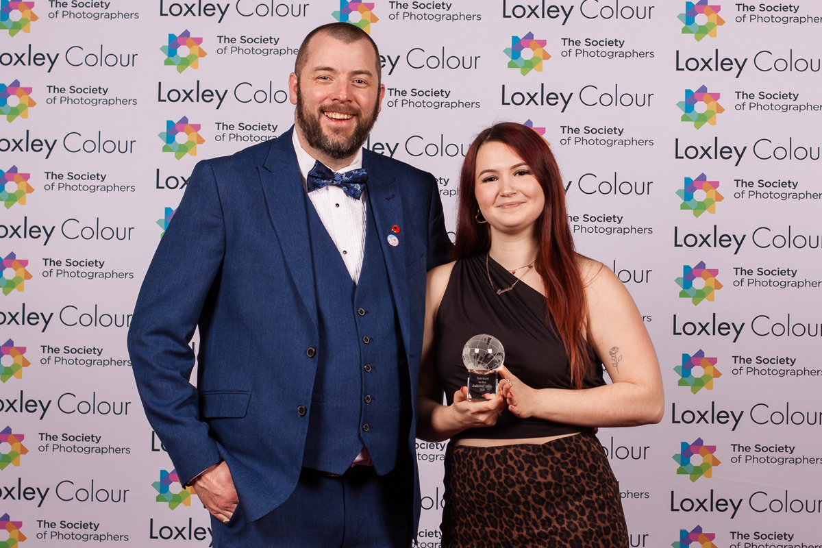 The Best Professional Camera 2024 "Colin Jones, The Society of Photographers’ CEO, presenting Caitlyn Baker, Canon Product and Channel Marketing Intern, with The Best Professional Camera 2024 Award at the ceremony."