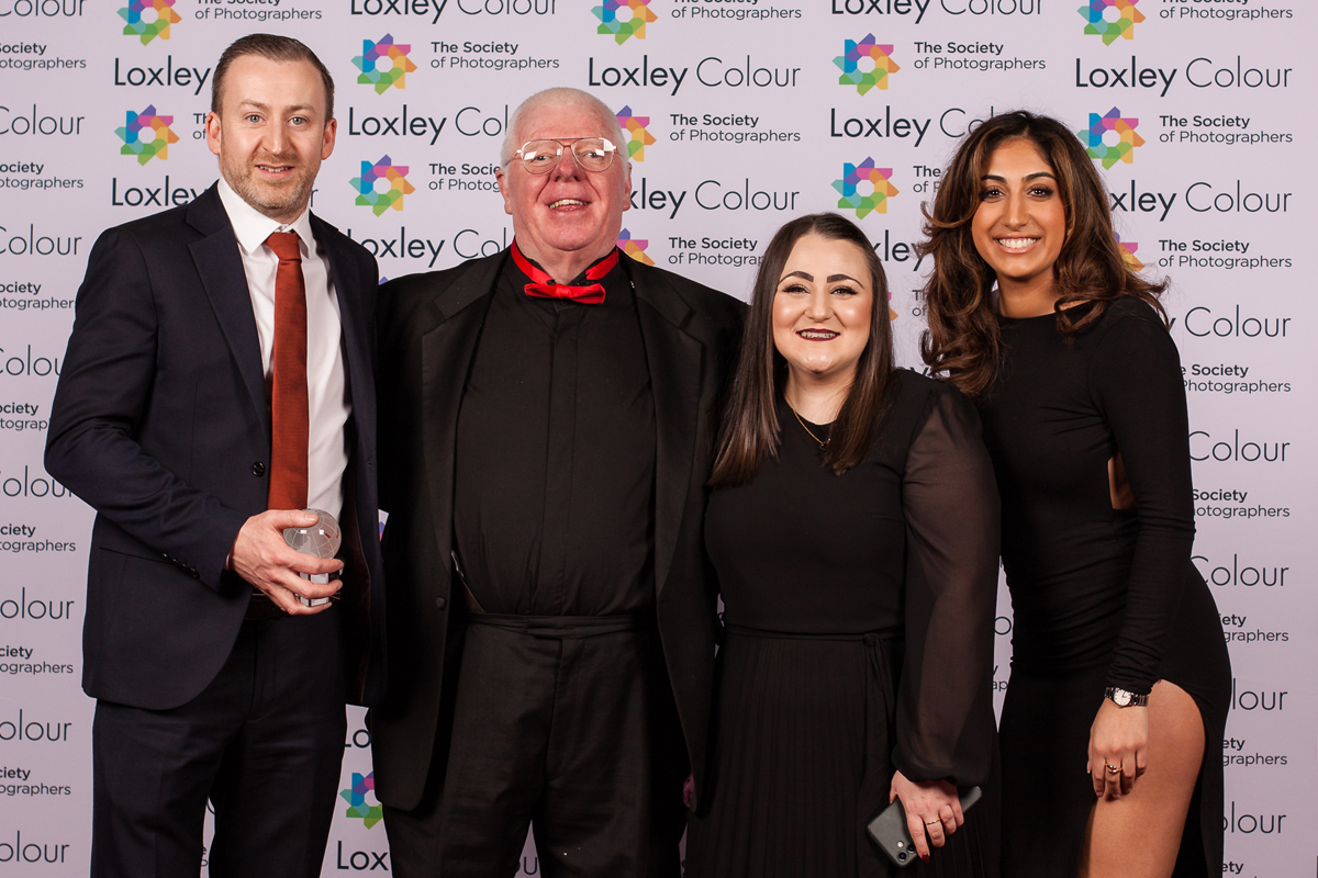 The Best Professional Lab 2024 "Phil Jones, The Society of Photographers’ Director, presenting The Loxley Colour Team with The Best Professional Lab 2024 Award at the ceremony."