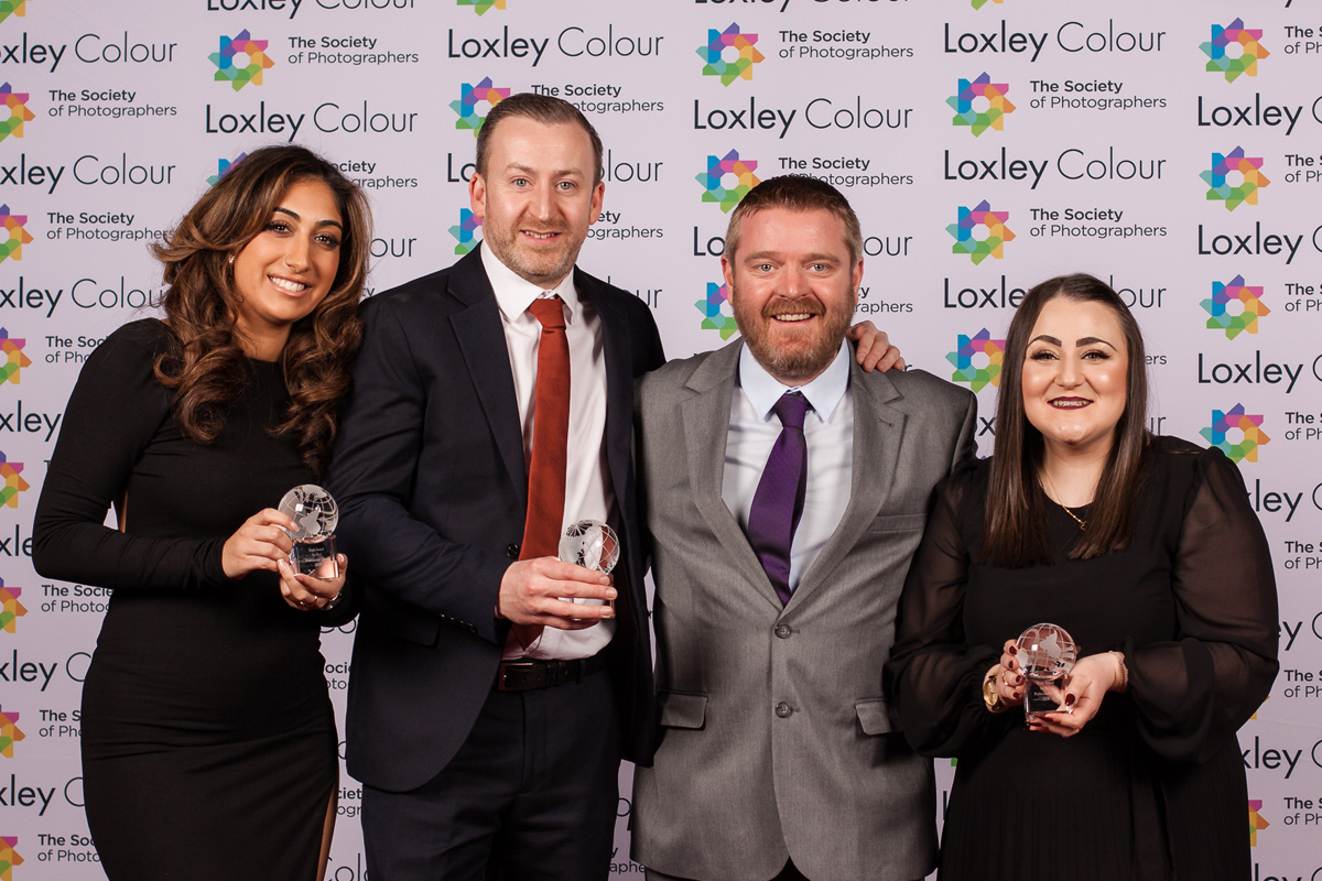 The Best Professional Service 2024 "Ben Jones, The Society of Photographers’ Member Value & Experience Manager, presenting The Loxley Colour Team with The Best Professional Service 2024 Award at the ceremony."