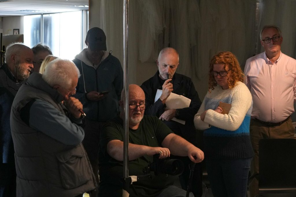 Damian McGillicuddy with attendees at the Widnes lighting workshop hosted by The Societies of Photographers.