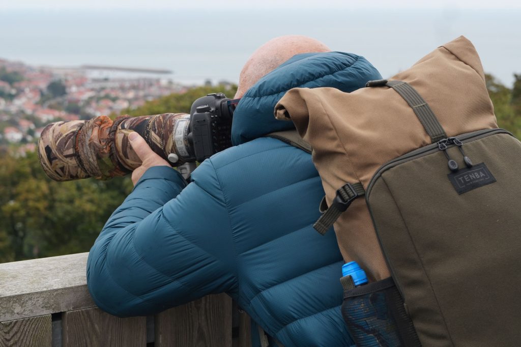 Wide shot of the Welsh Mountain Zoo with photographers capturing wildlife.