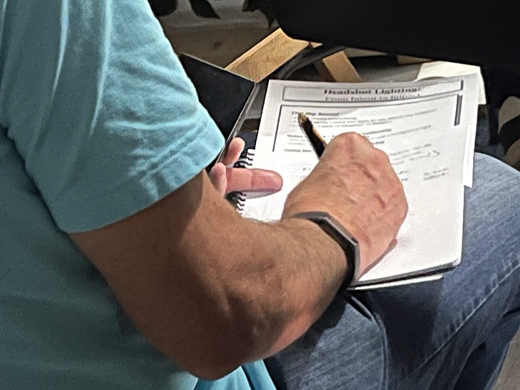 Photographer taking notes