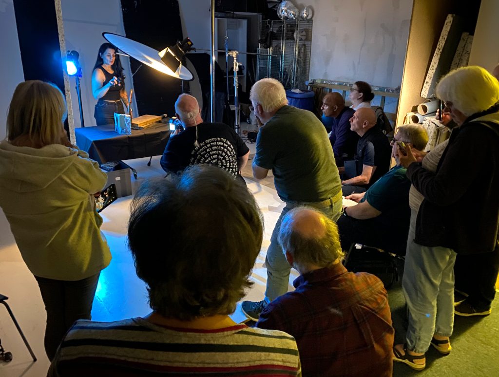 Photographers observing Damian McGillicuddy’s demonstration on creating professional product images during the seminar in Widnes.