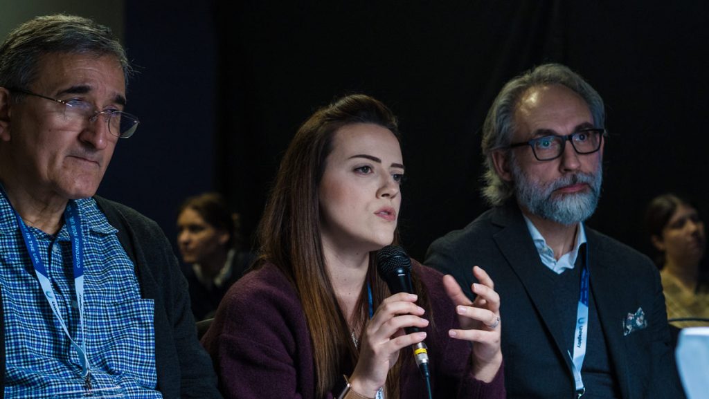 Professional photography judges discussing image impact, composition and technical quality
